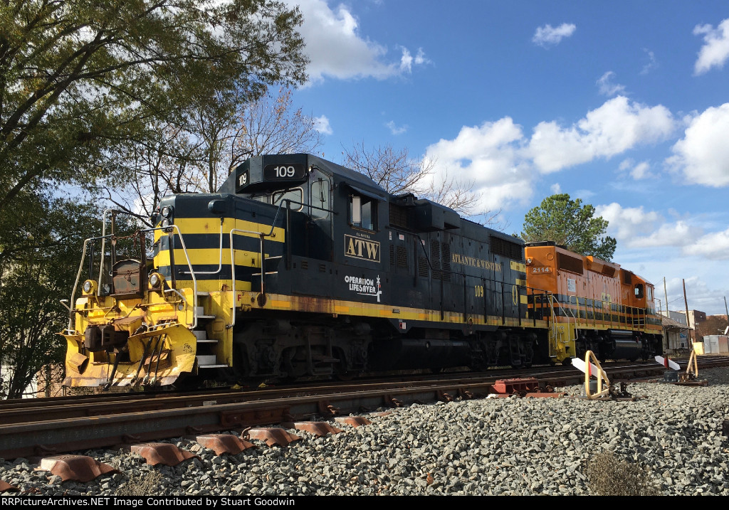 ATW's GP7 #109 sits with GC's GP38-2 on siding is Sanford, NC
